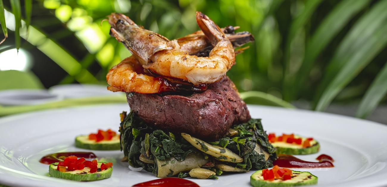fried meat with prawns zuccihni spinach mushroom side view